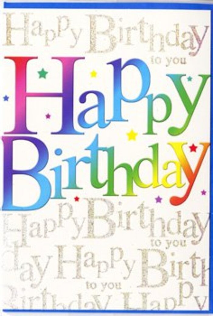 This birthday card has the kind of joyful presence that would stand out on a mantelpiece in a Seven Sisters home, surrounded by flowers and gifts. Dominating the design is the phrase Happy Birthday, printed in large, confident letters that run horizontally across the centre of the card. Each letter is filled with a different colour, collectively forming a bright, continuous rainbow. You can imagine the sequence of hues moving from deep red into juicy orange, then into sunny yellow, fresh spring green, cool turquoise, and through to rich indigo and velvety purple, each tone flowing gently into the next. The typeface is bold yet soft around the edges, giving a feeling of friendliness and fun. Behind this main text, the background is not plain; instead, it is layered with an intricate pattern of repeated words in delicate golden script. This script reads Happy Birthday to you over and over, written in a looping, cursive style that looks almost hand-penned. The gold ink has a subtle glittering quality, suggesting a soft sparkle like candlelight glimmering in a window overlooking Seven Sisters Road in the evening. Light seems to skim across the card, picking up the shimmer in the script and giving depth to the design. Small, scattered star shapes and coloured specks add to the festive feeling, as if tiny bursts of celebration are dotted around the main message. The card appears to be printed on smooth, slightly glossy stock, giving it a sleek, tactile quality when held. It's the sort of carefully designed birthday card that pairs effortlessly with a colourful bouquet, helping to express warmth, excitement, and thoughtfulness in one vivid gesture.